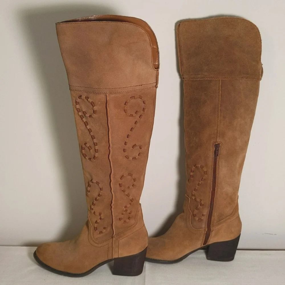 Carlos Santana stylish tan